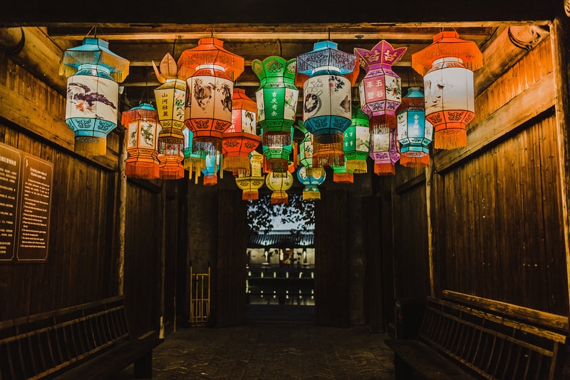 photo of assorted-color Chinese lanterns inside room